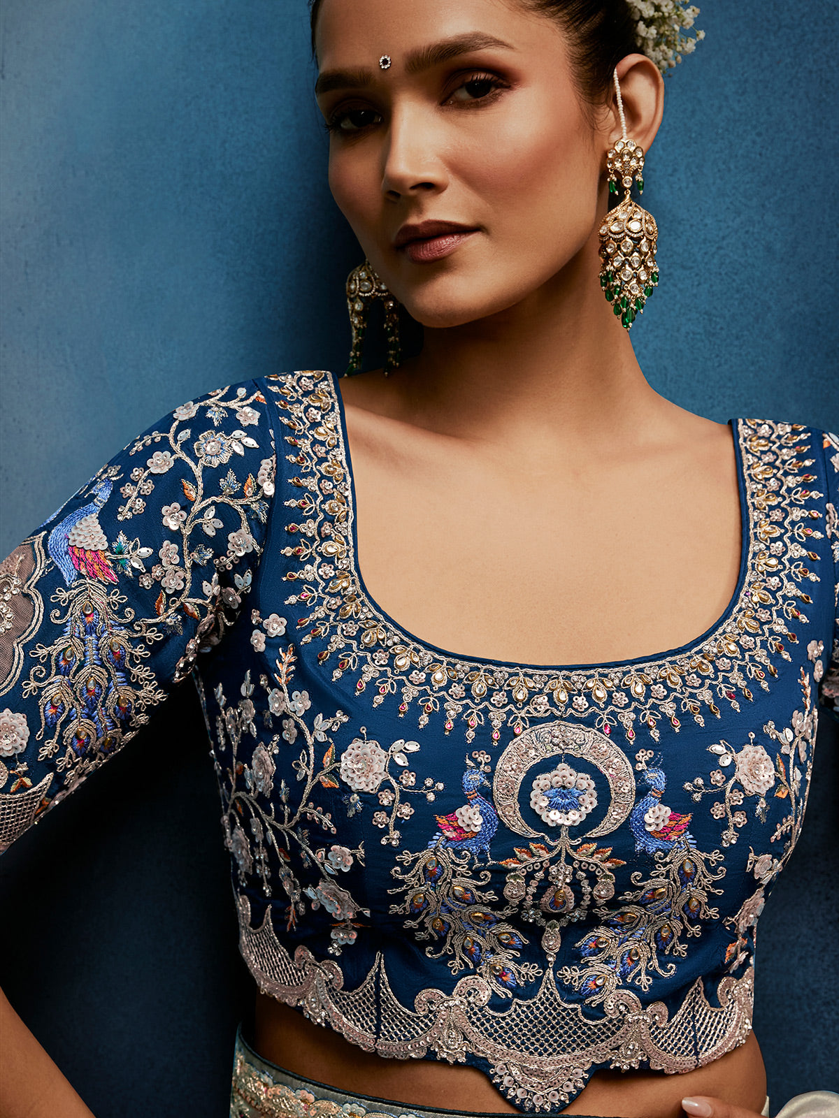 Pista green tissue silk saree with bold navy blouse