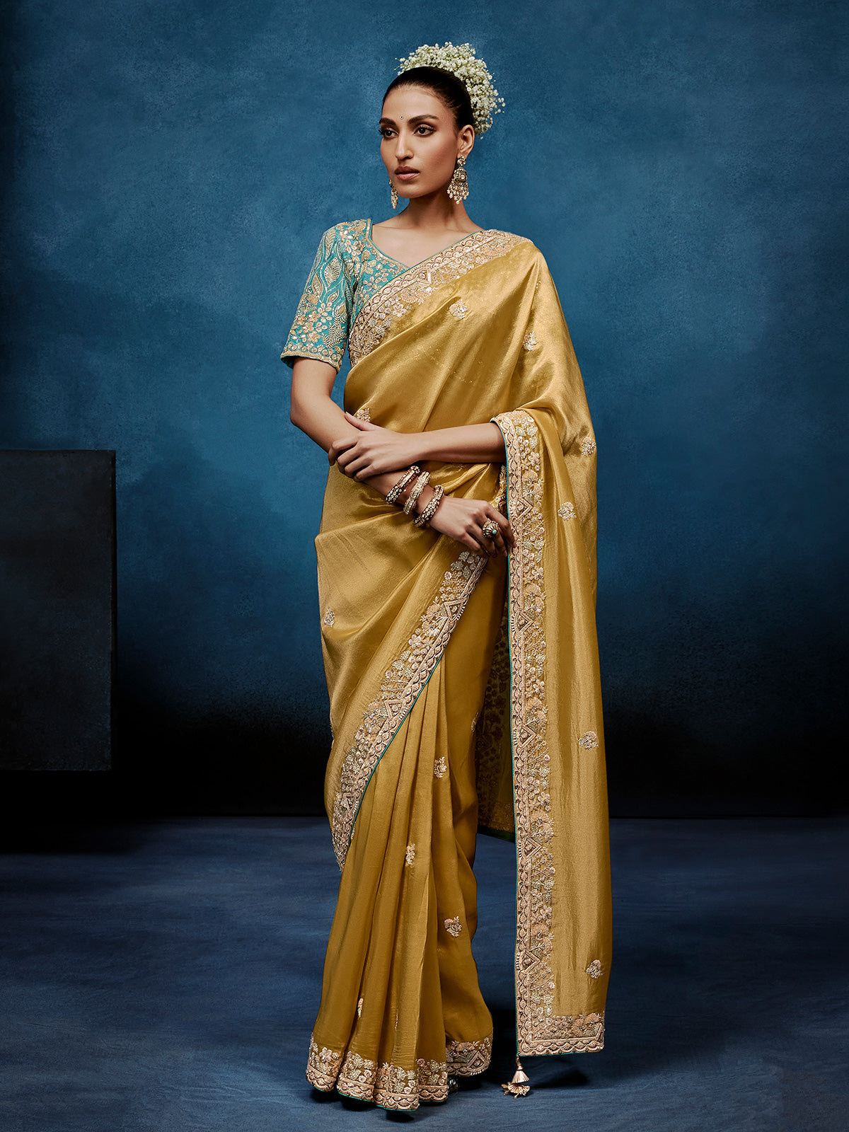 Beige tissue silk saree for graceful wedding celebrations