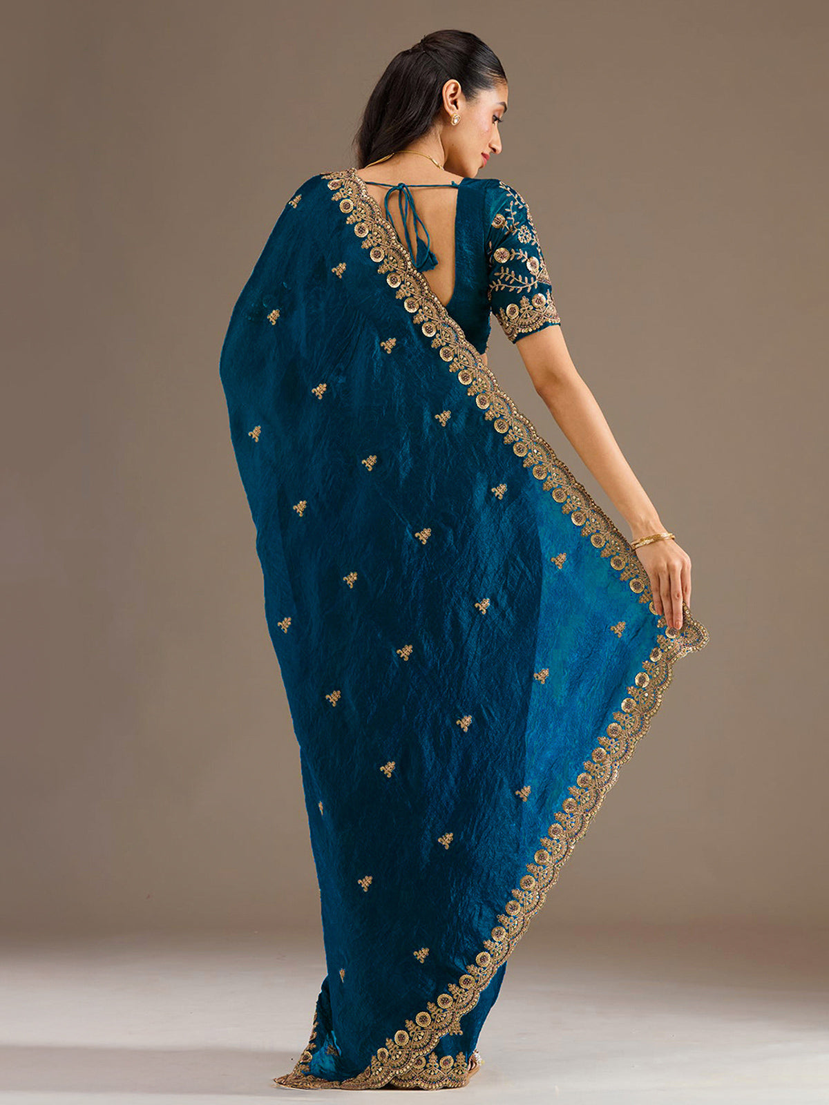 Dove blue tissue saree for festive wear