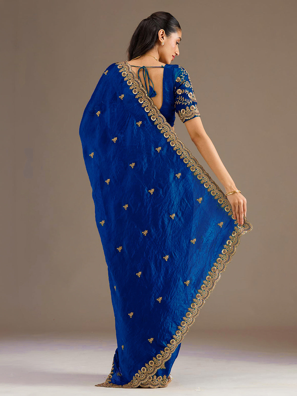 Royal blue tissue saree with thread and sequins work