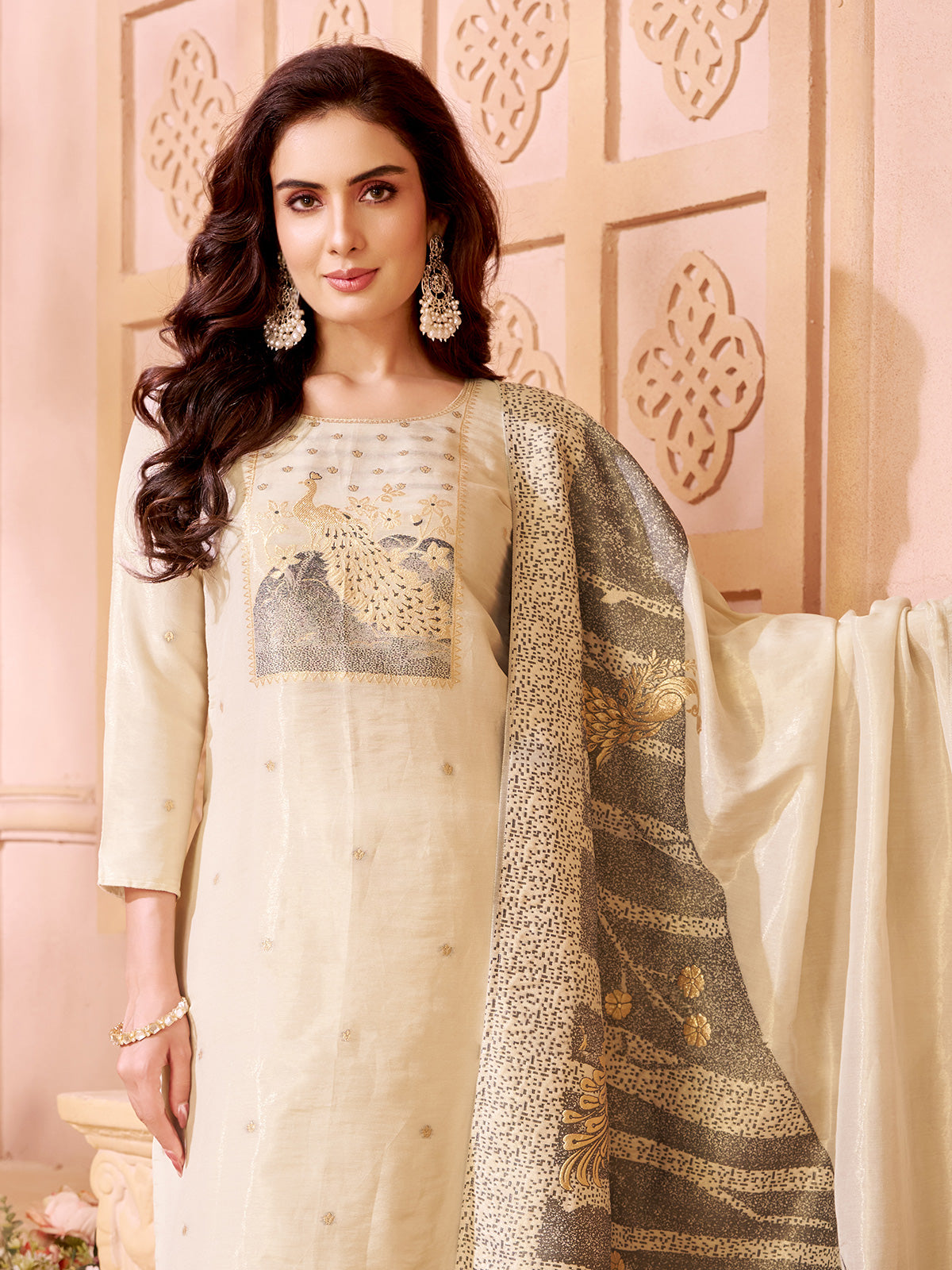 Cream silk straight cut salwar suit with peacock motifs