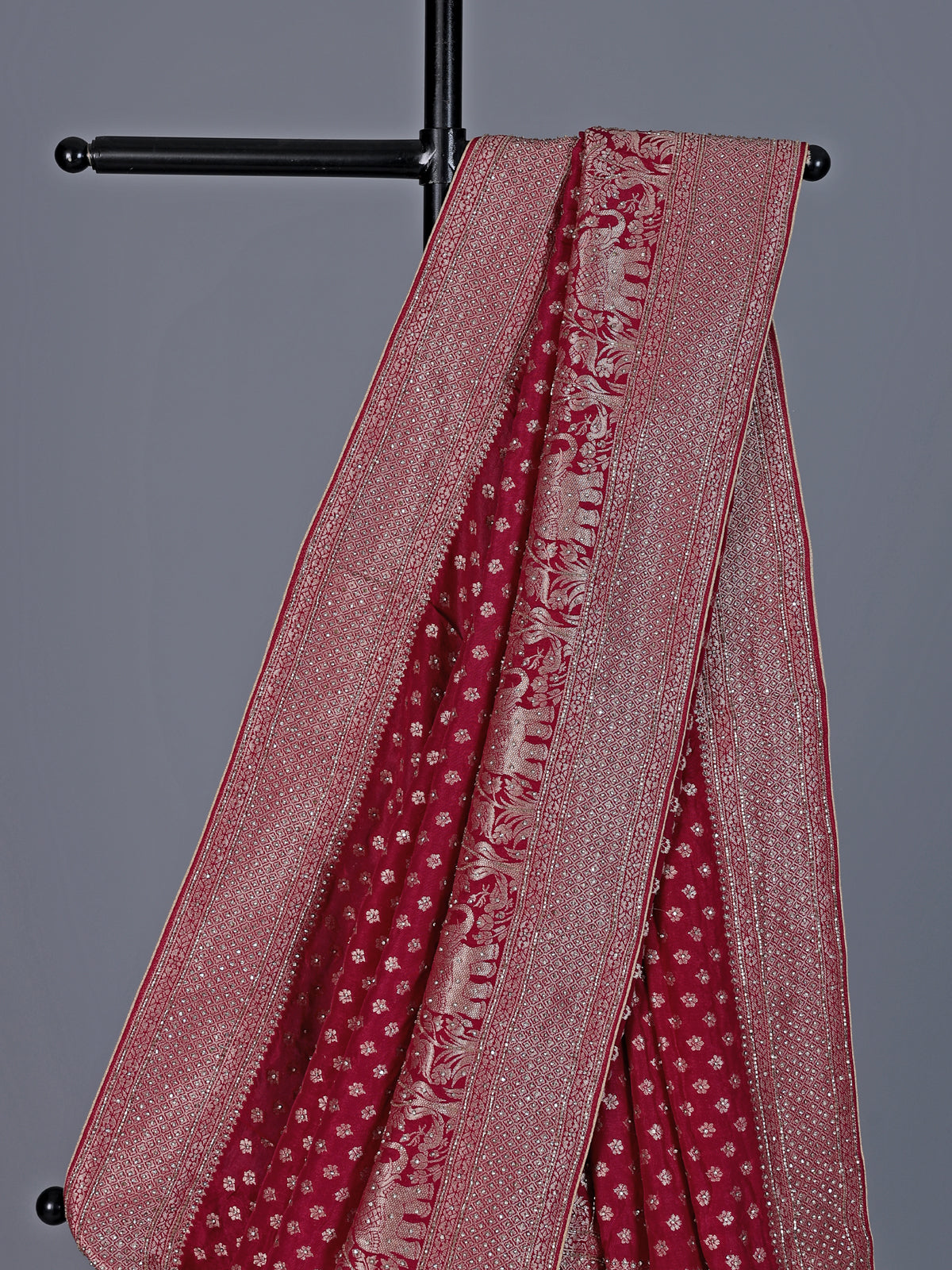 Maroon dola silk saree with elephant motif zari design