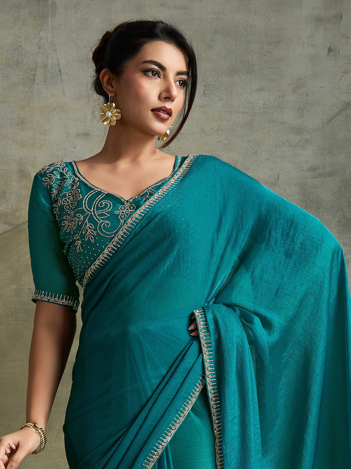 Stylish rama blue chiffon reception wear saree