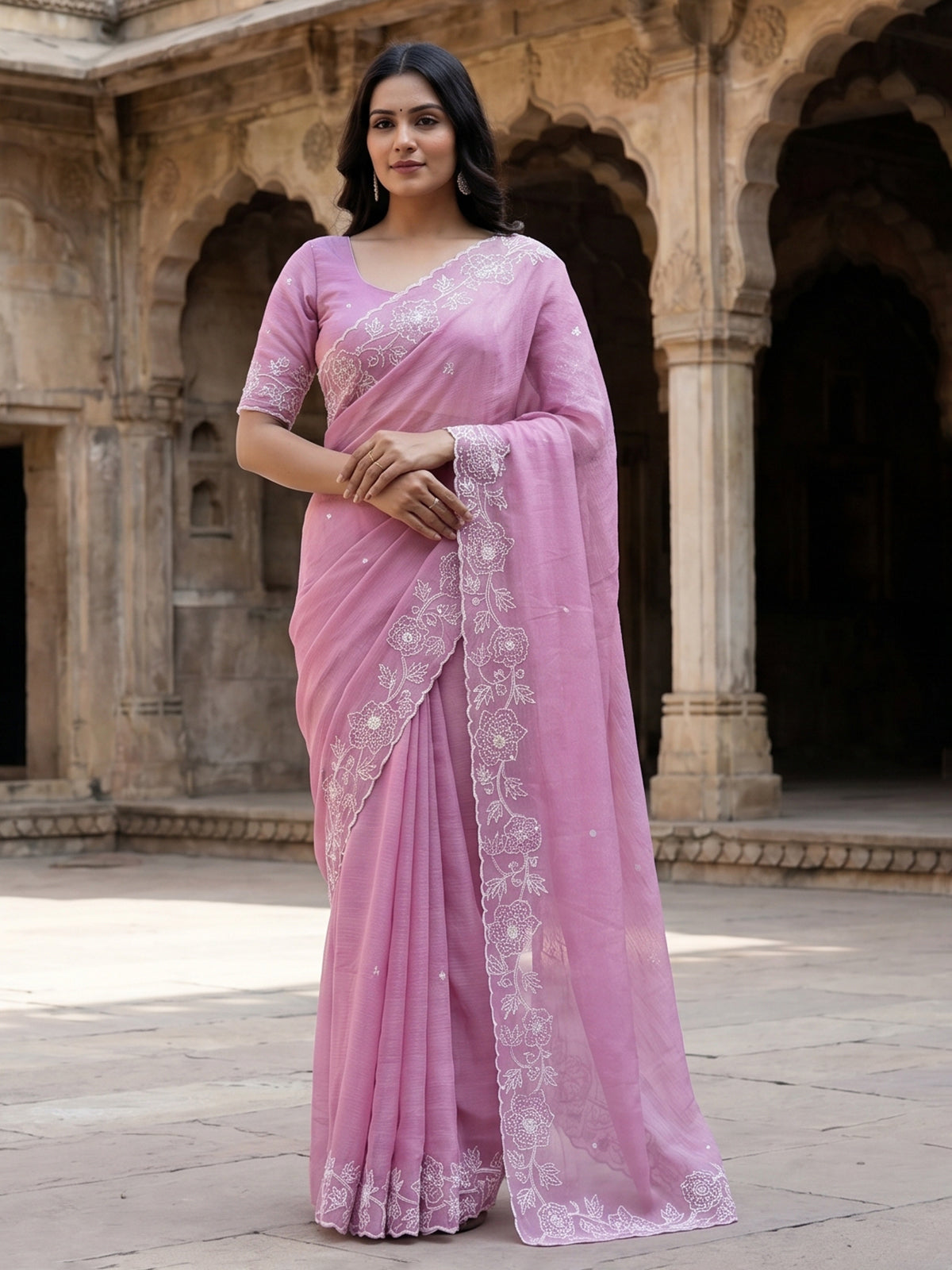 Pink crushed tissue saree with elegant festive sequins detailing