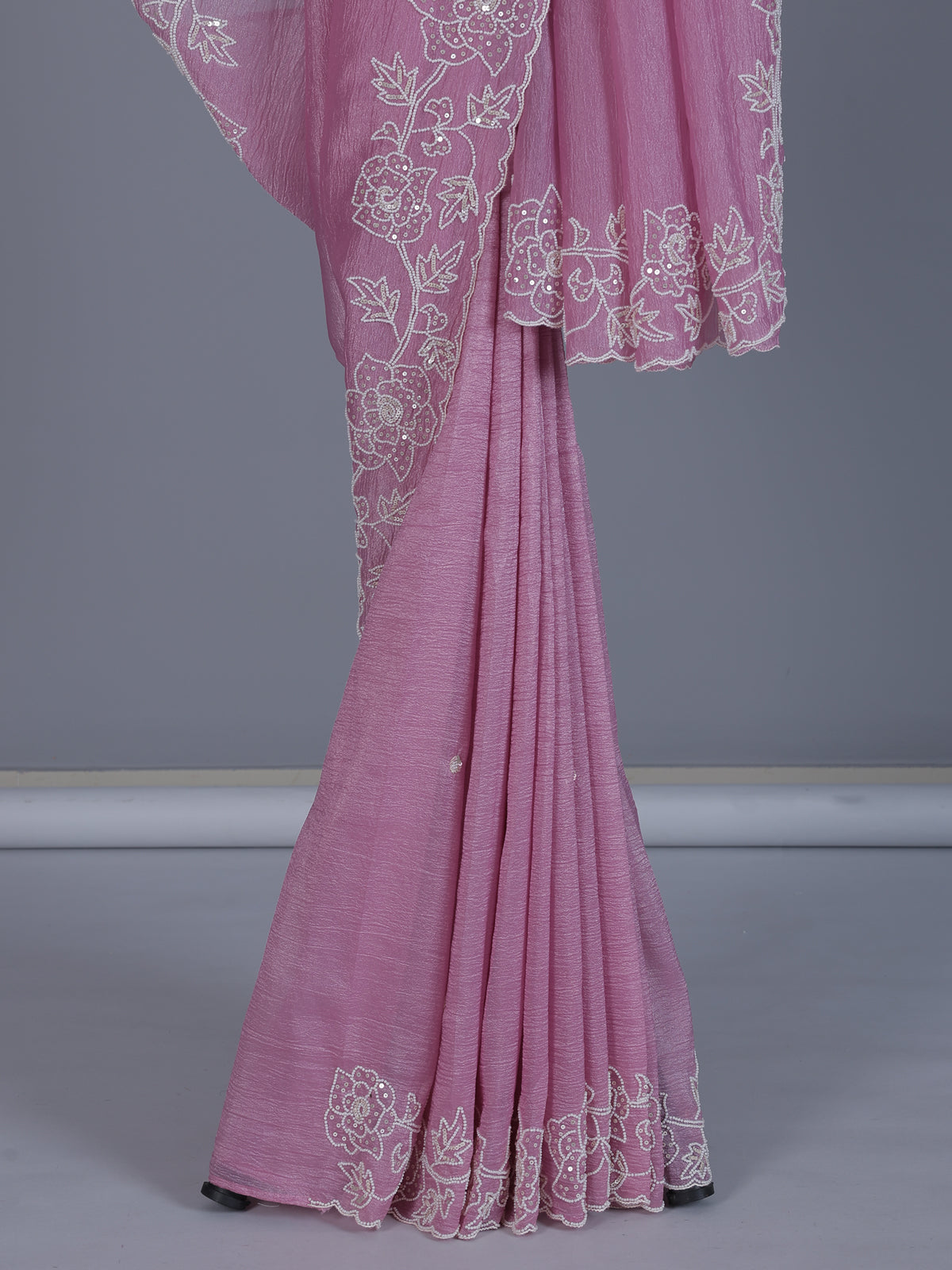 Pink crushed tissue saree with elegant festive sequins detailing