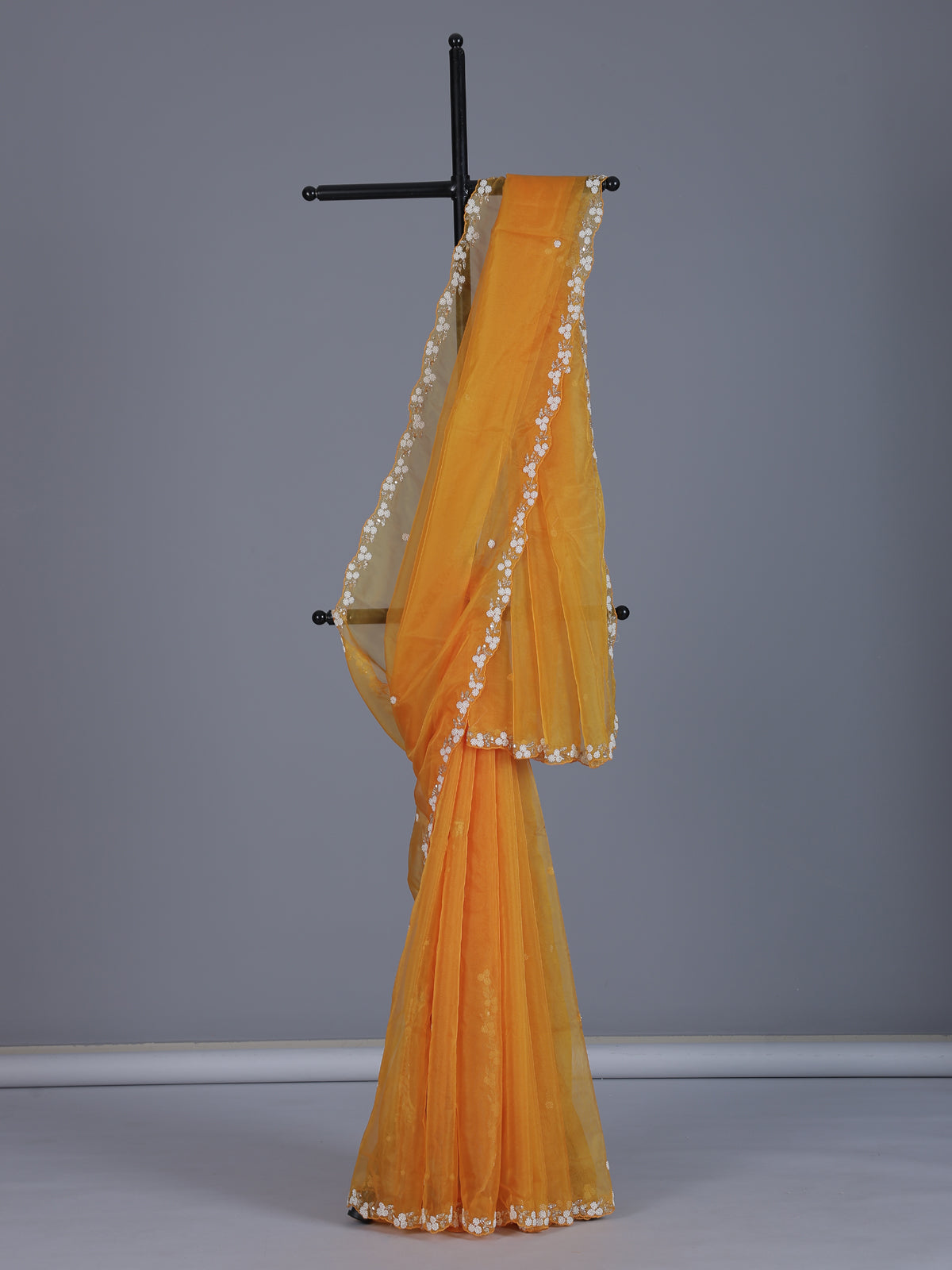 Mustard yellow organza tissue saree with festive sequins shimmer