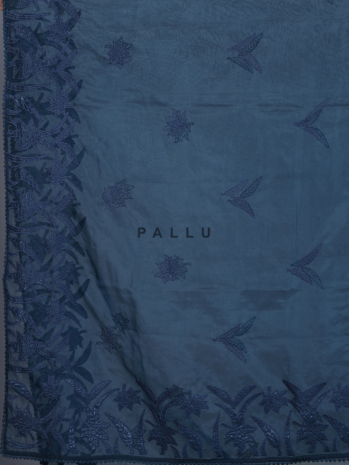 Navy blue organza tissue saree with sophisticated embroidery elegance