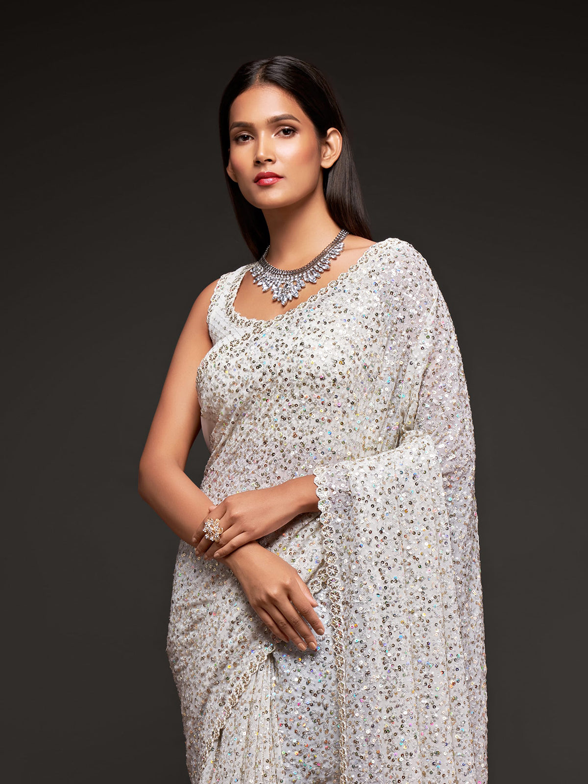 Royal pearl white reception georgette saree