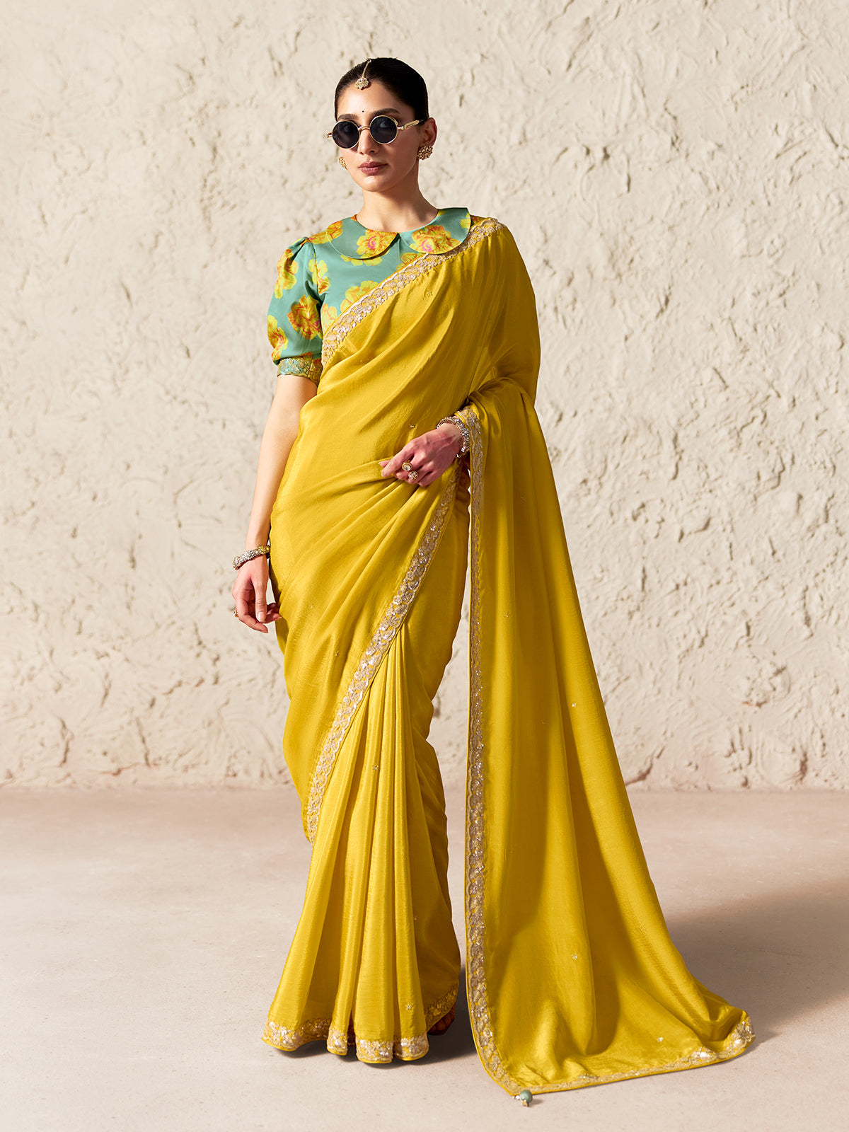 Radiant yellow embellished organza saree