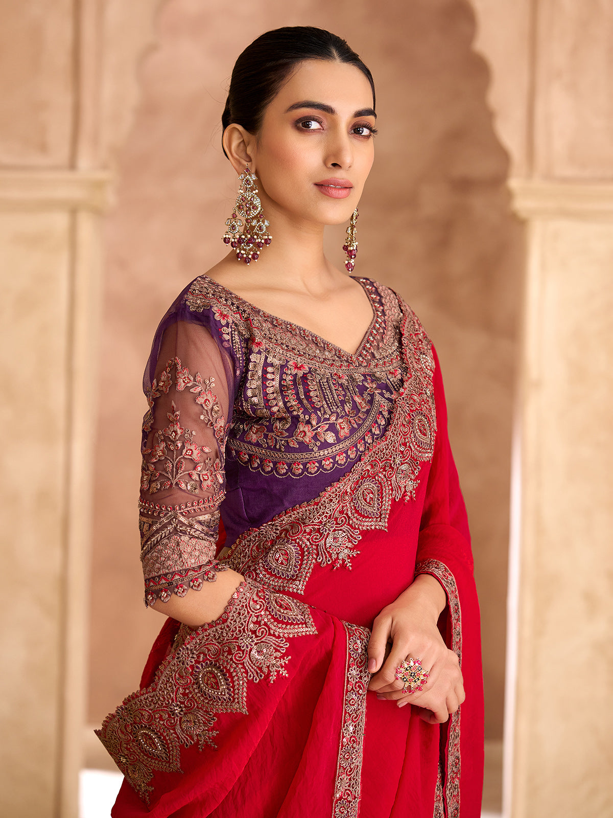 Cherry red luxurious zari wedding saree statement