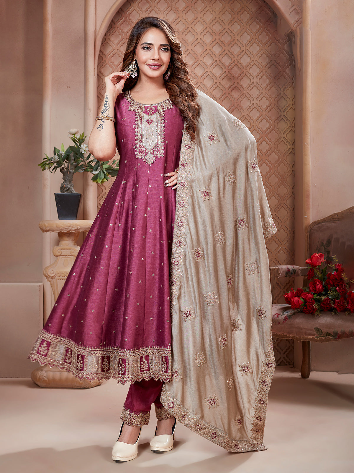 Onion pink sleeveless silk salwar suit for festive celebration