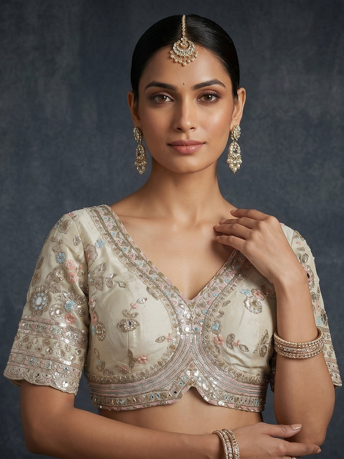 Cream scalloped masterpiece lehenga with royal elegance