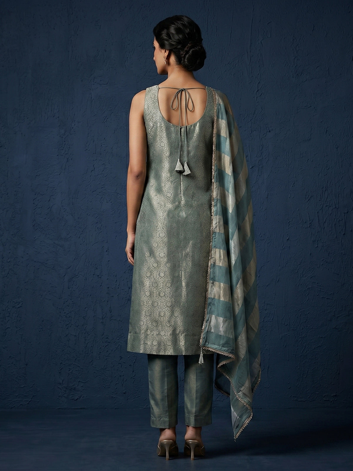Green metallic brocade salwar suit with front-slit kameez