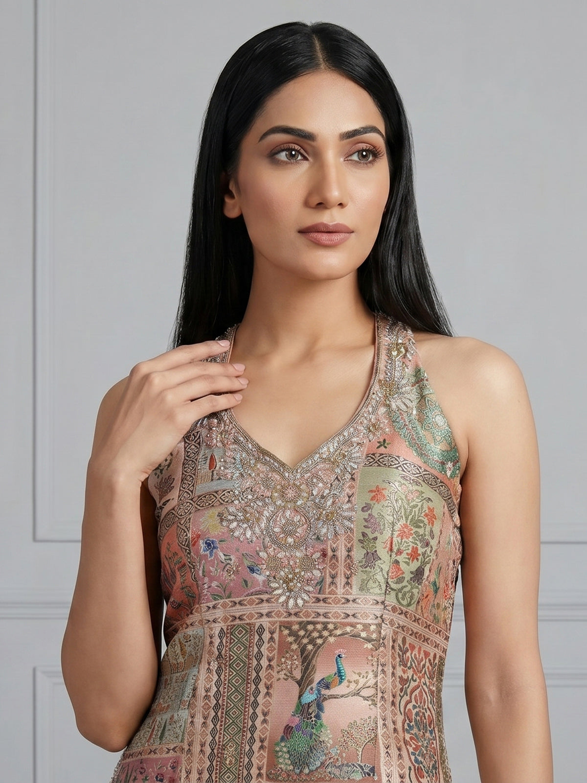 Pastel peach silk sharara suit with rich embellishment