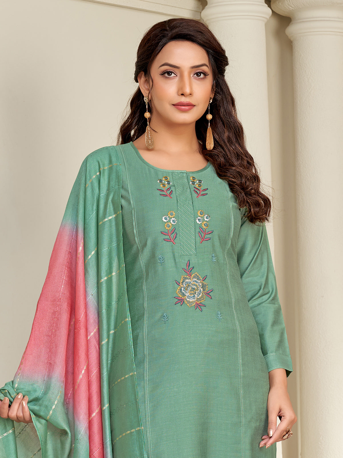 Green silk salwar suit with embroidered detailing