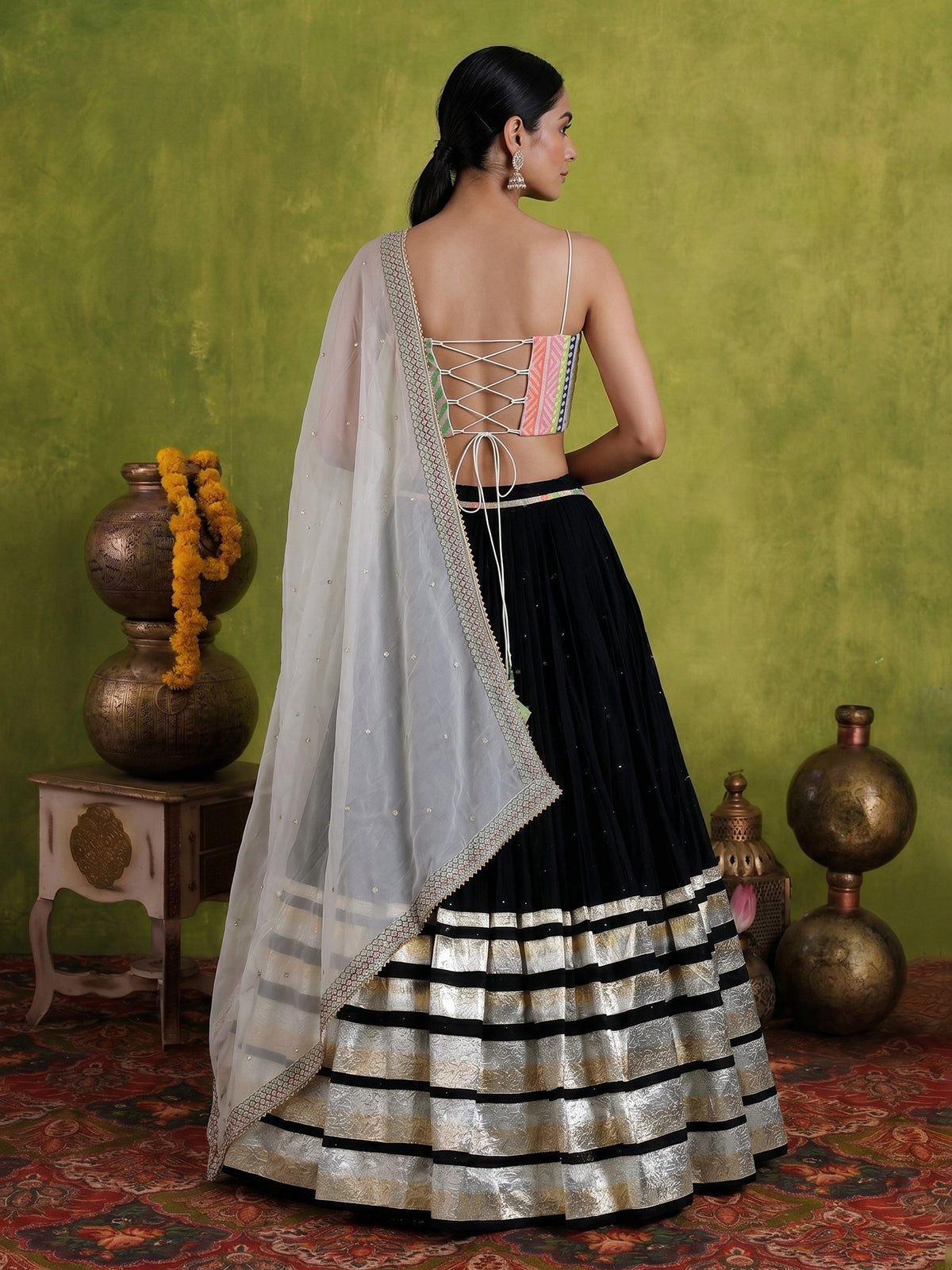 Black tissue silk navratri wear lehenga choli with sleeveless choli