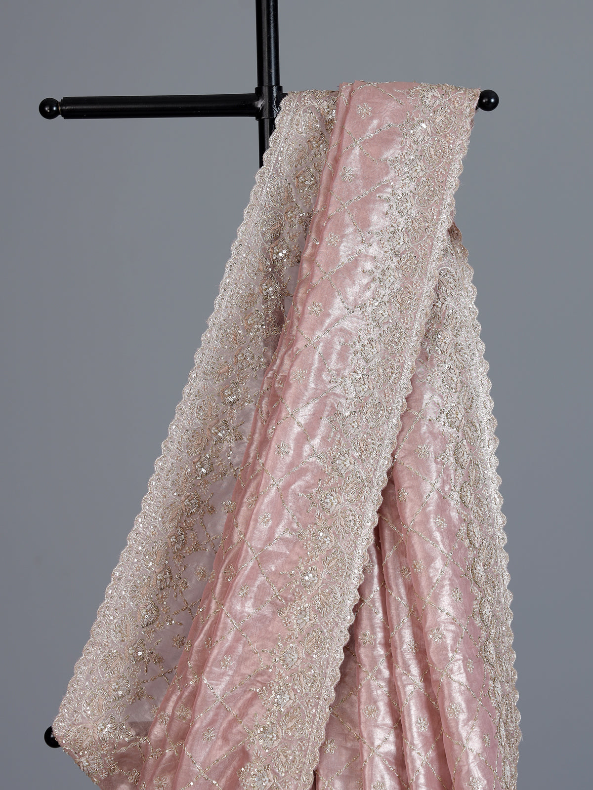 Peach tissue silk saree for wedding celebration