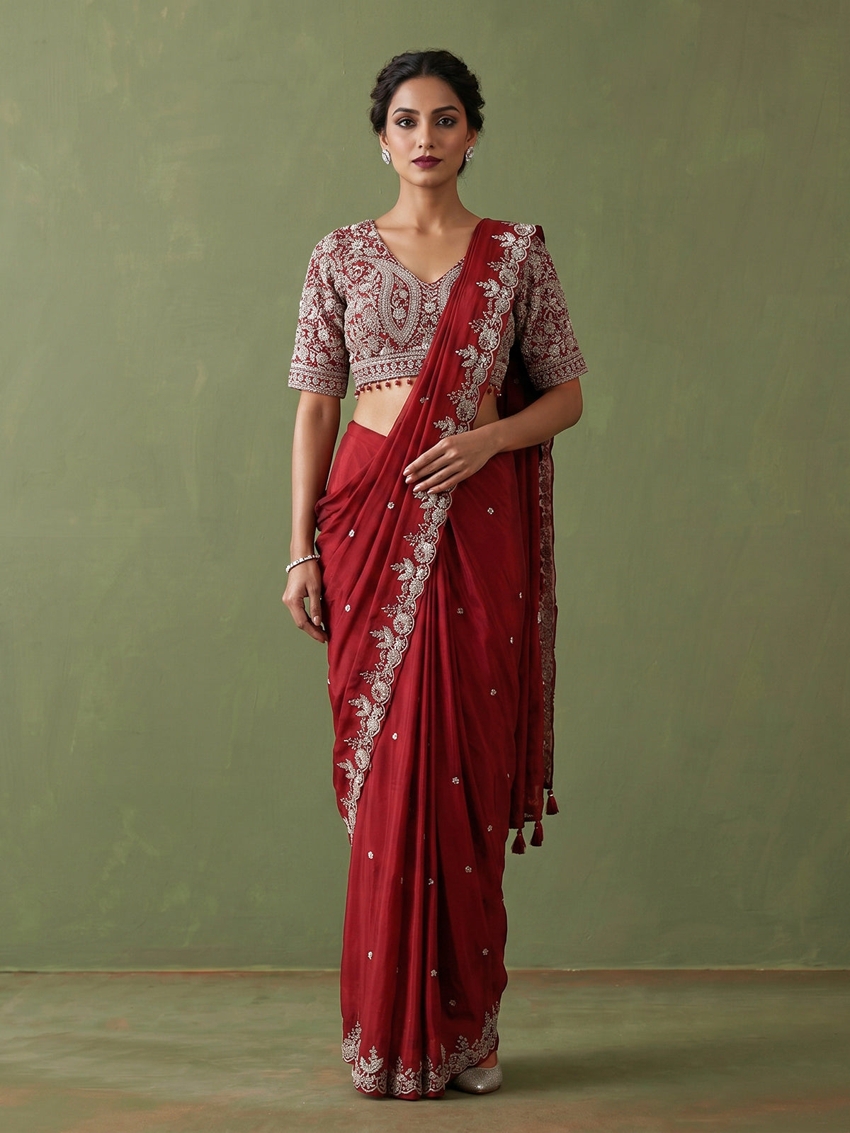 Maroon tissue silk designer saree with elegant embellishments