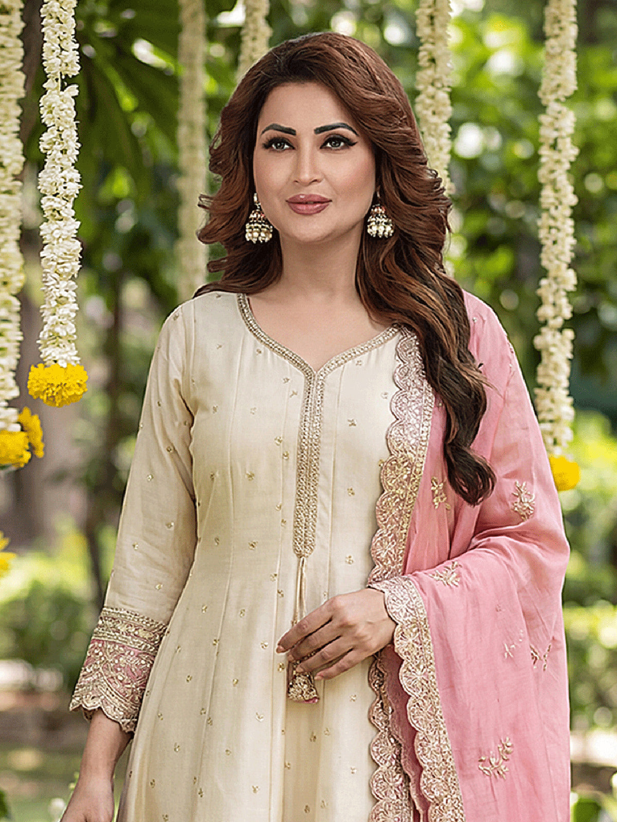 Cream silk heavily embellished festive anarkali suit