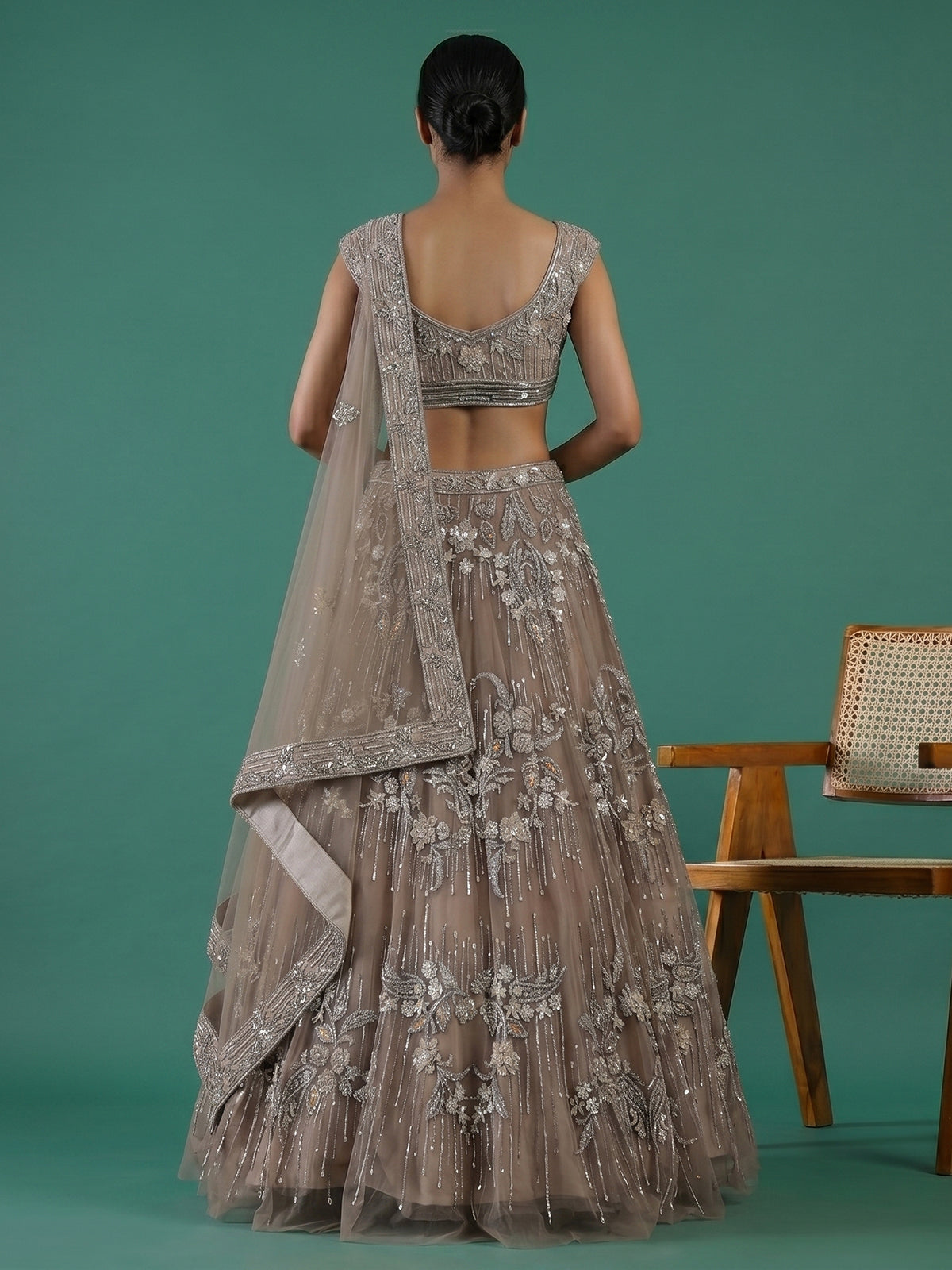 Beige net embellished lehenga choli for wedding functions