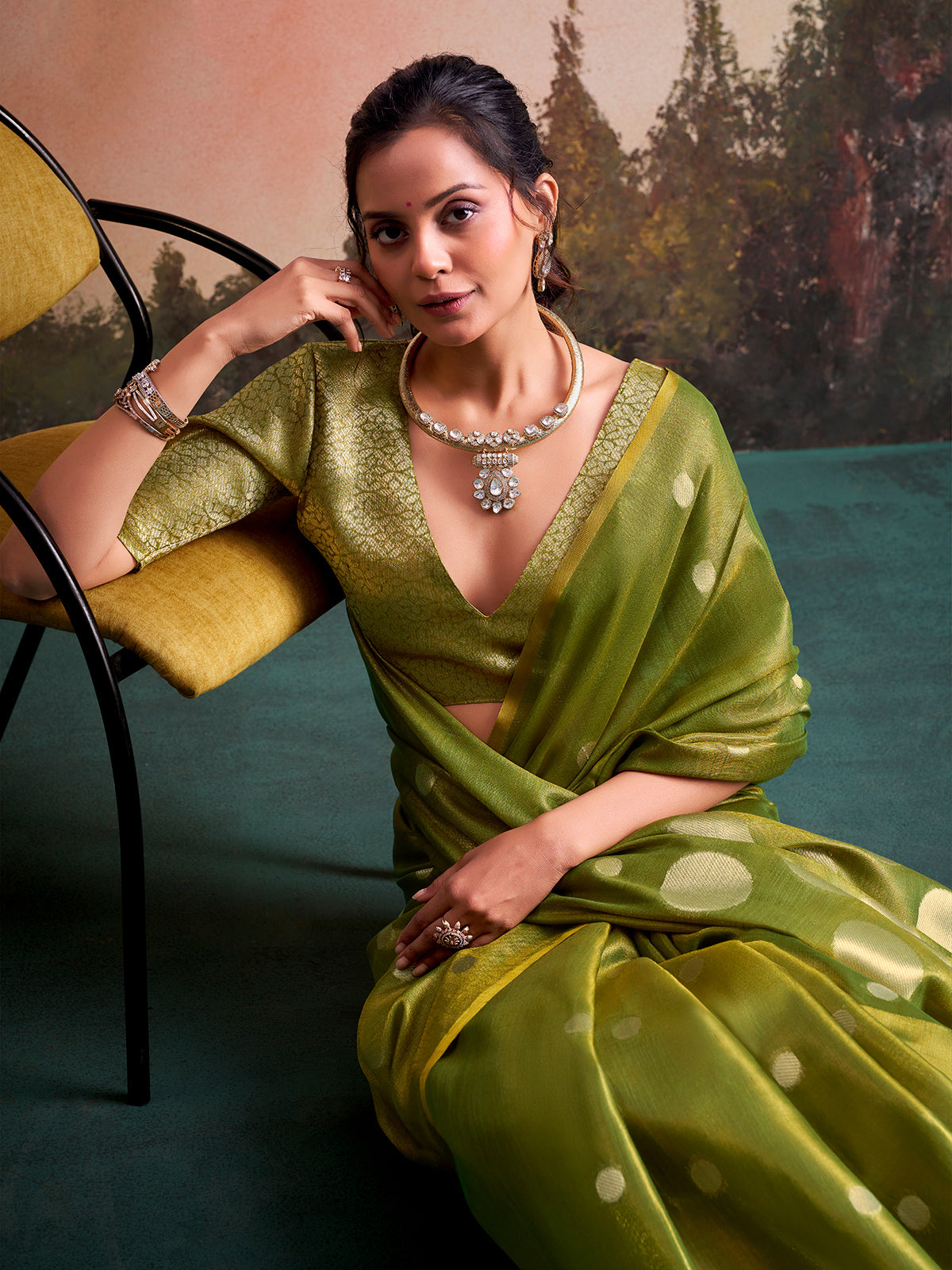 Royal green zari detailed tissue silk saree