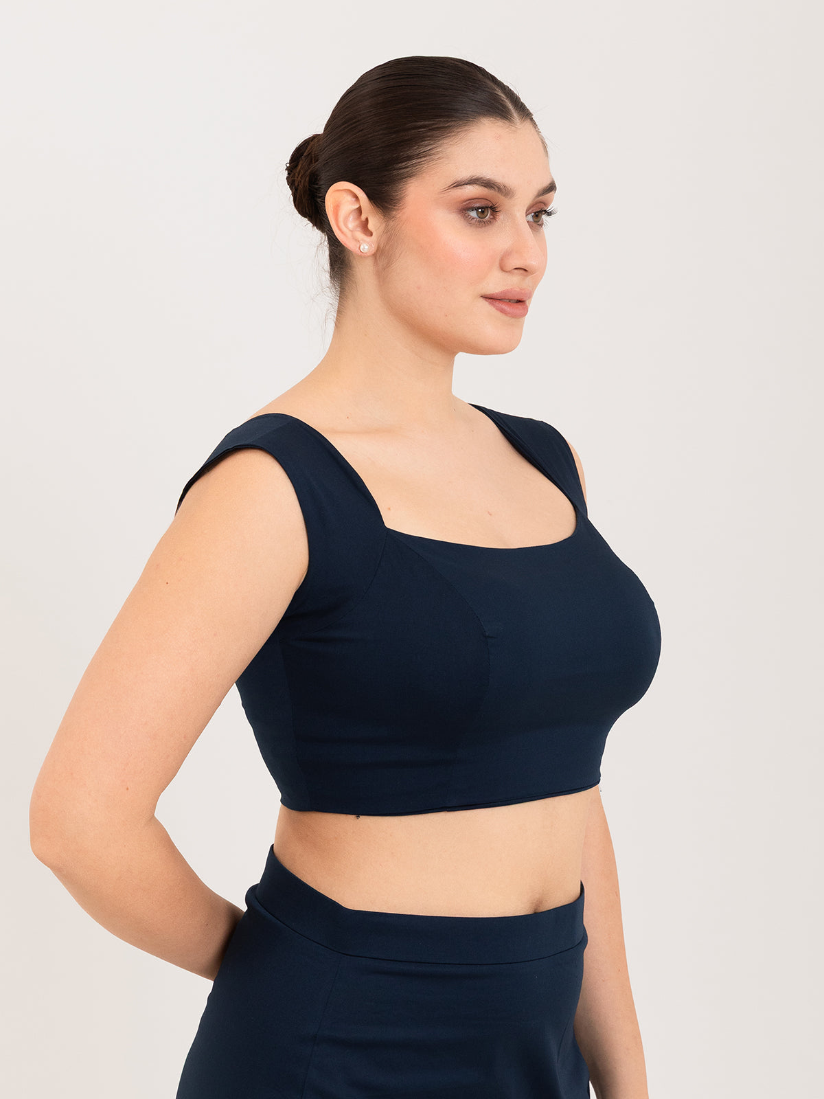 Blue cotton lycra curved sweetheart neck sleeveless blouse
