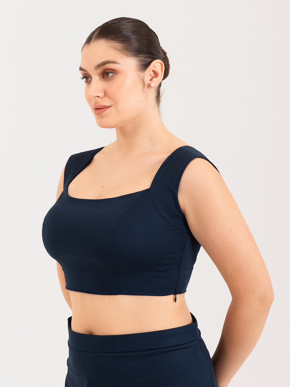 Blue cotton lycra curved sweetheart neck sleeveless blouse