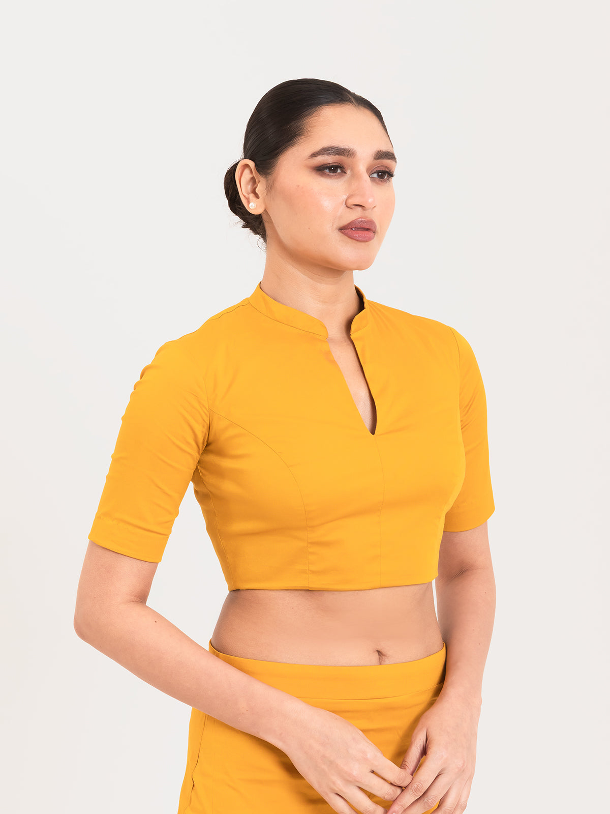 Yellow cotton lycra collar neck half sleeves blouse