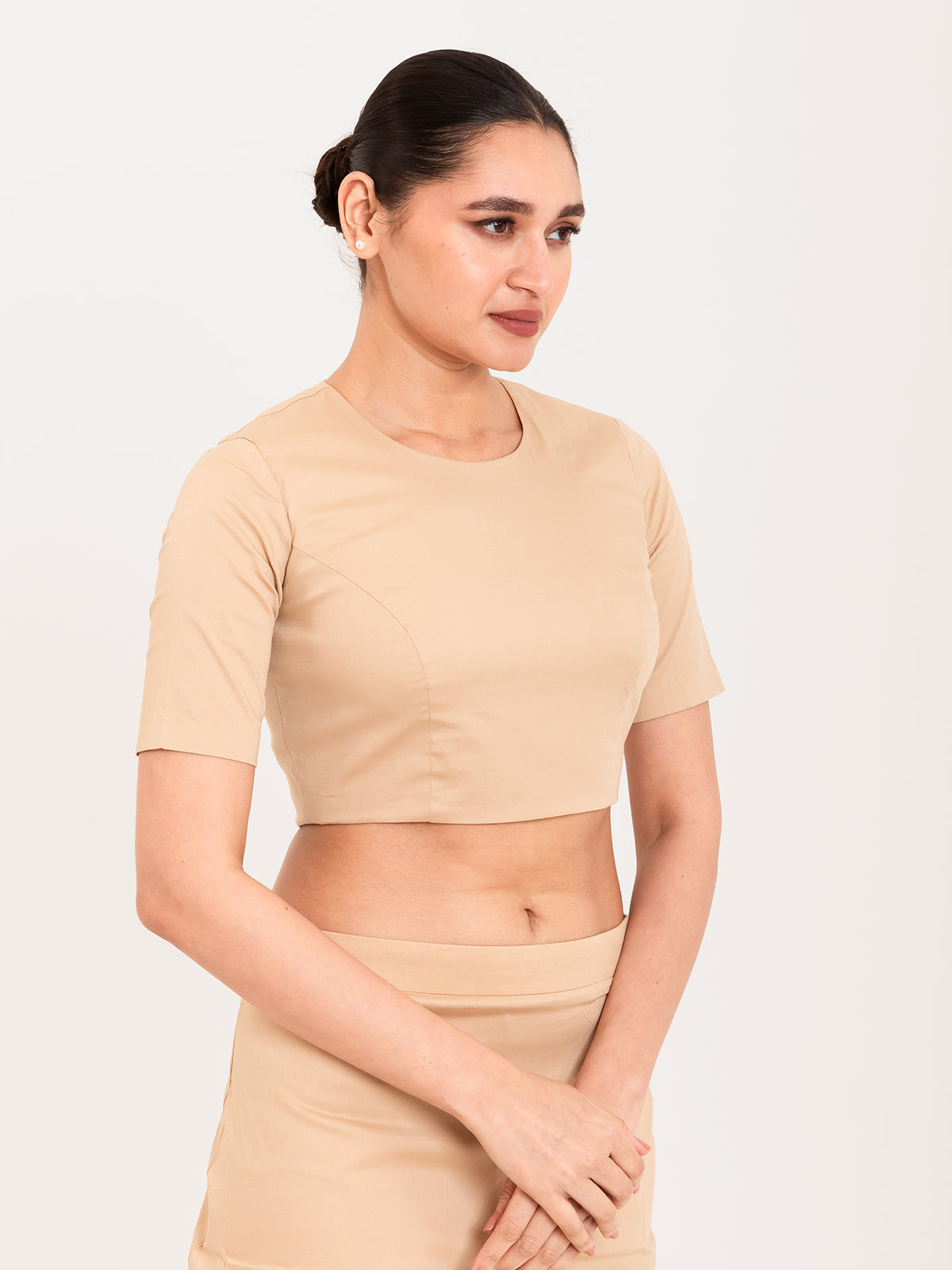 Beige cotton lycra round neck sleeveless blouse