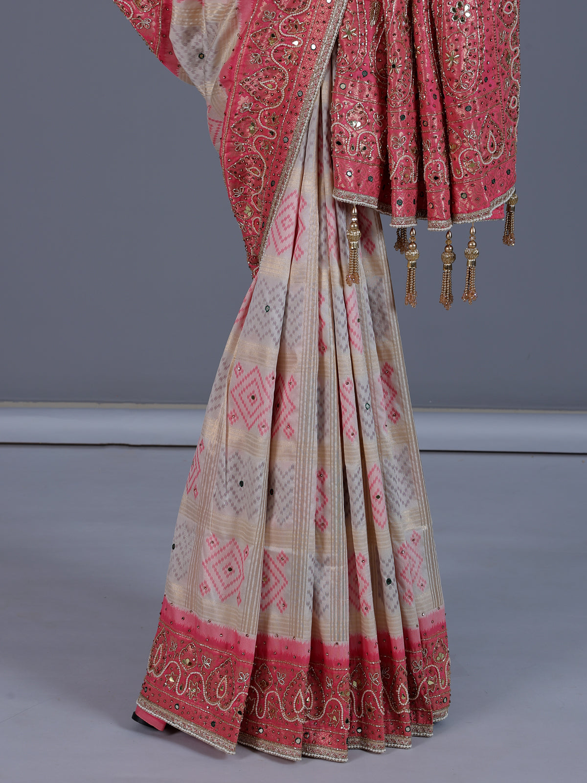 Cream art silk saree with festive printed border