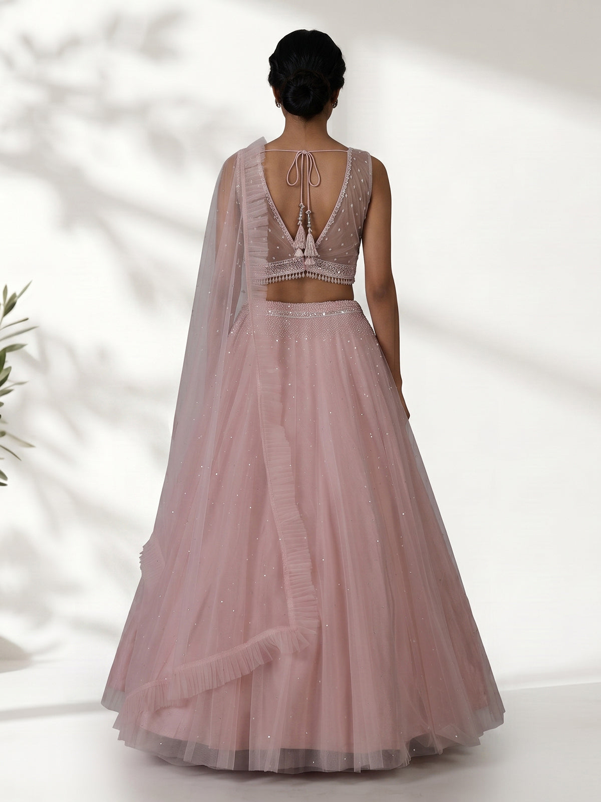 Pink designer net embellished lehenga choli