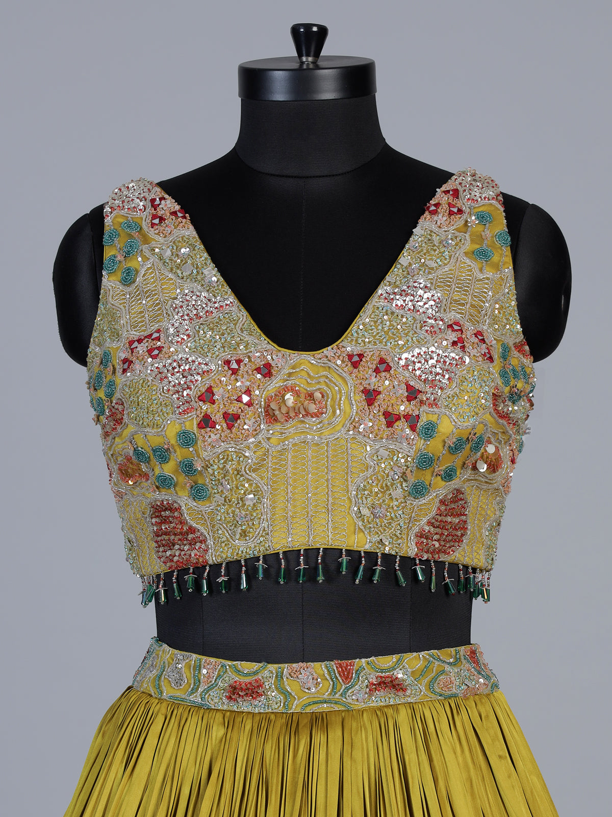 Yellow chinon silk haldi lehenga choli with choker