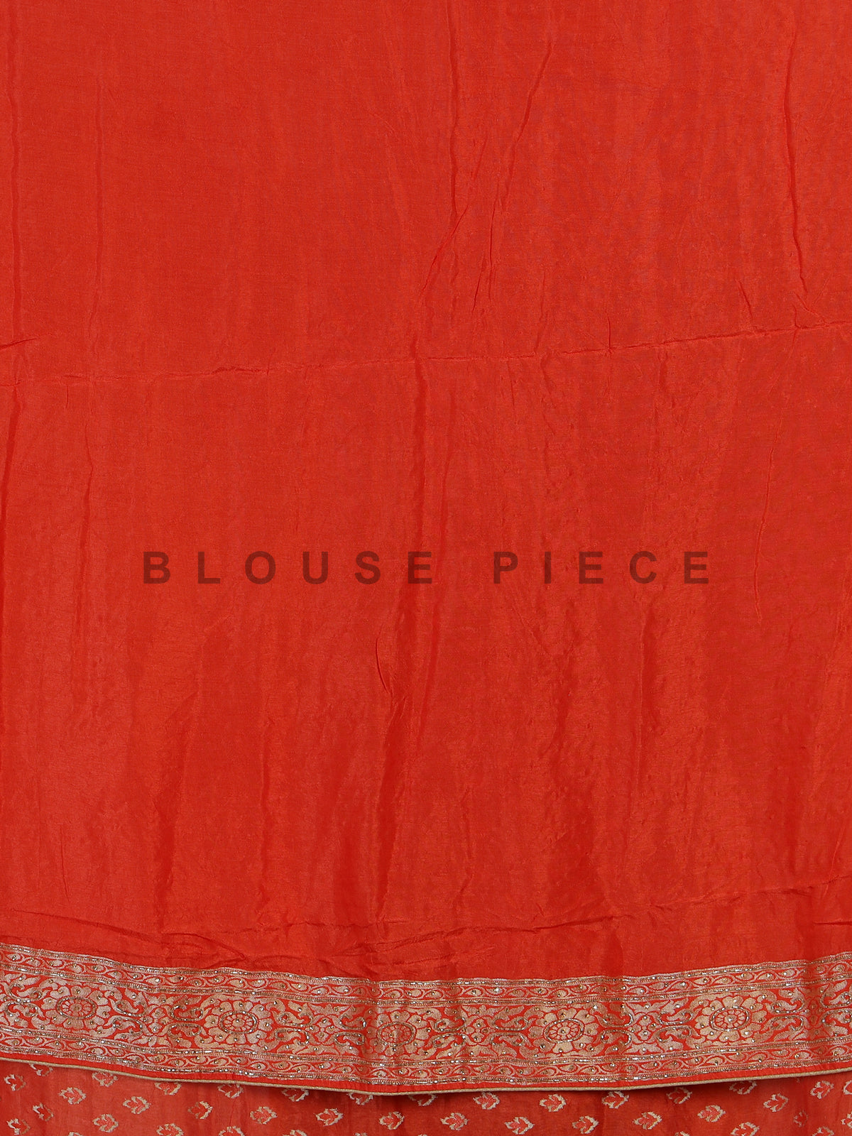 Rust orange premium dola silk saree with elegant zari artistry