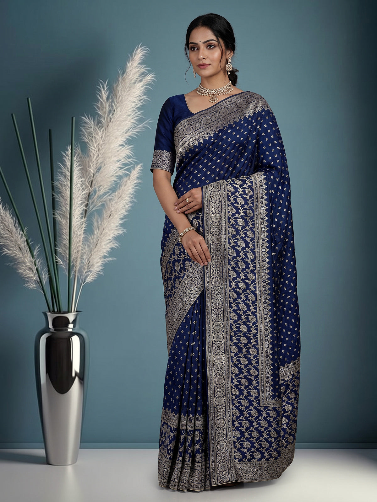 Blue designer dola silk saree with luxurious floral zari weaving
