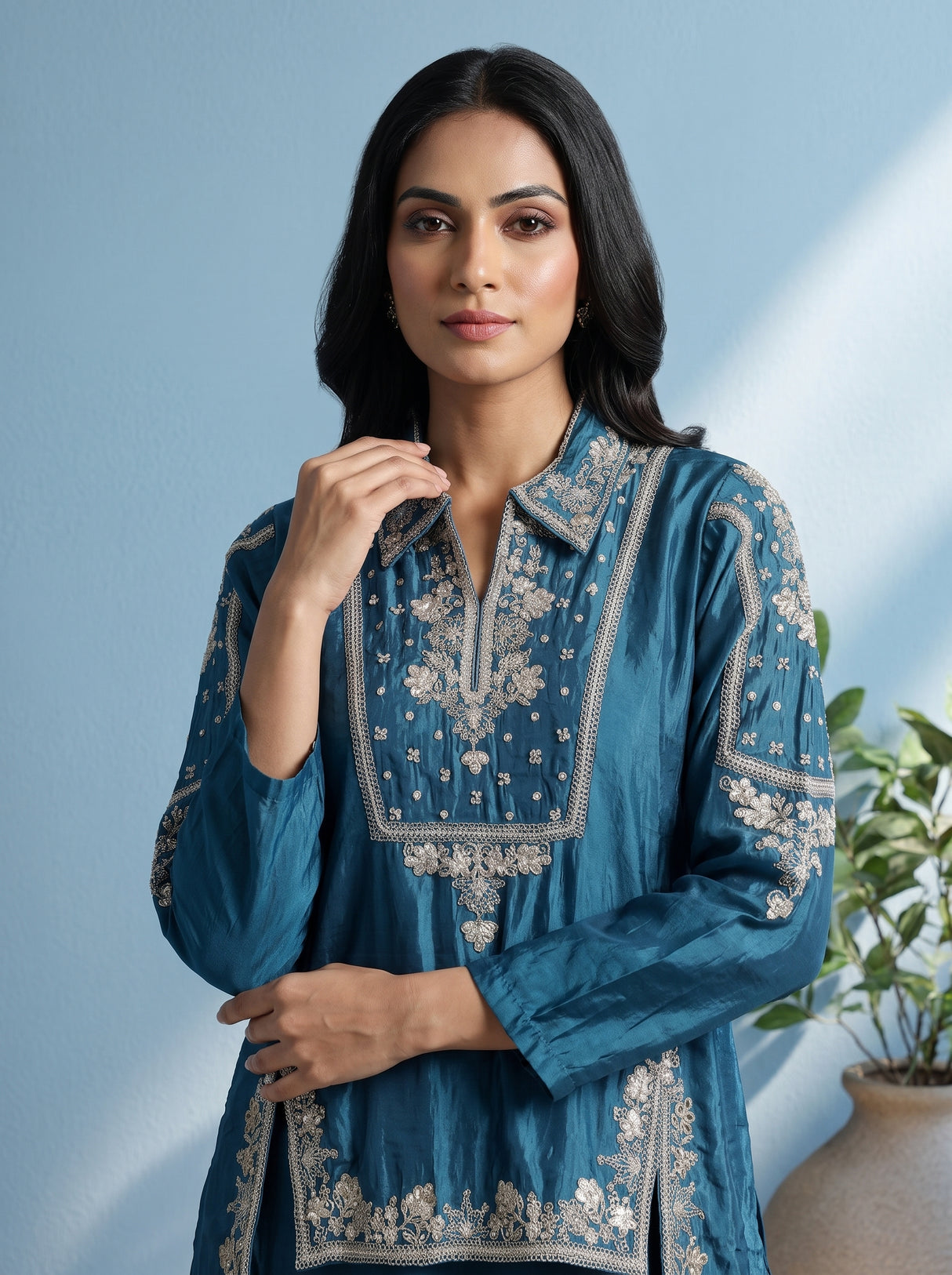 Blue designer silk sharara suit with contemporary asymmetrical style