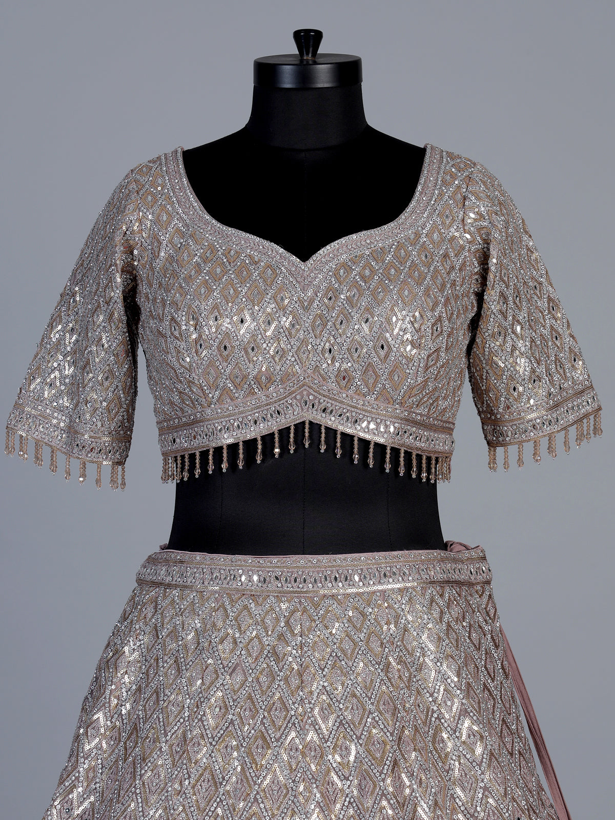 Onion pink embellished net designer lehenga choli
