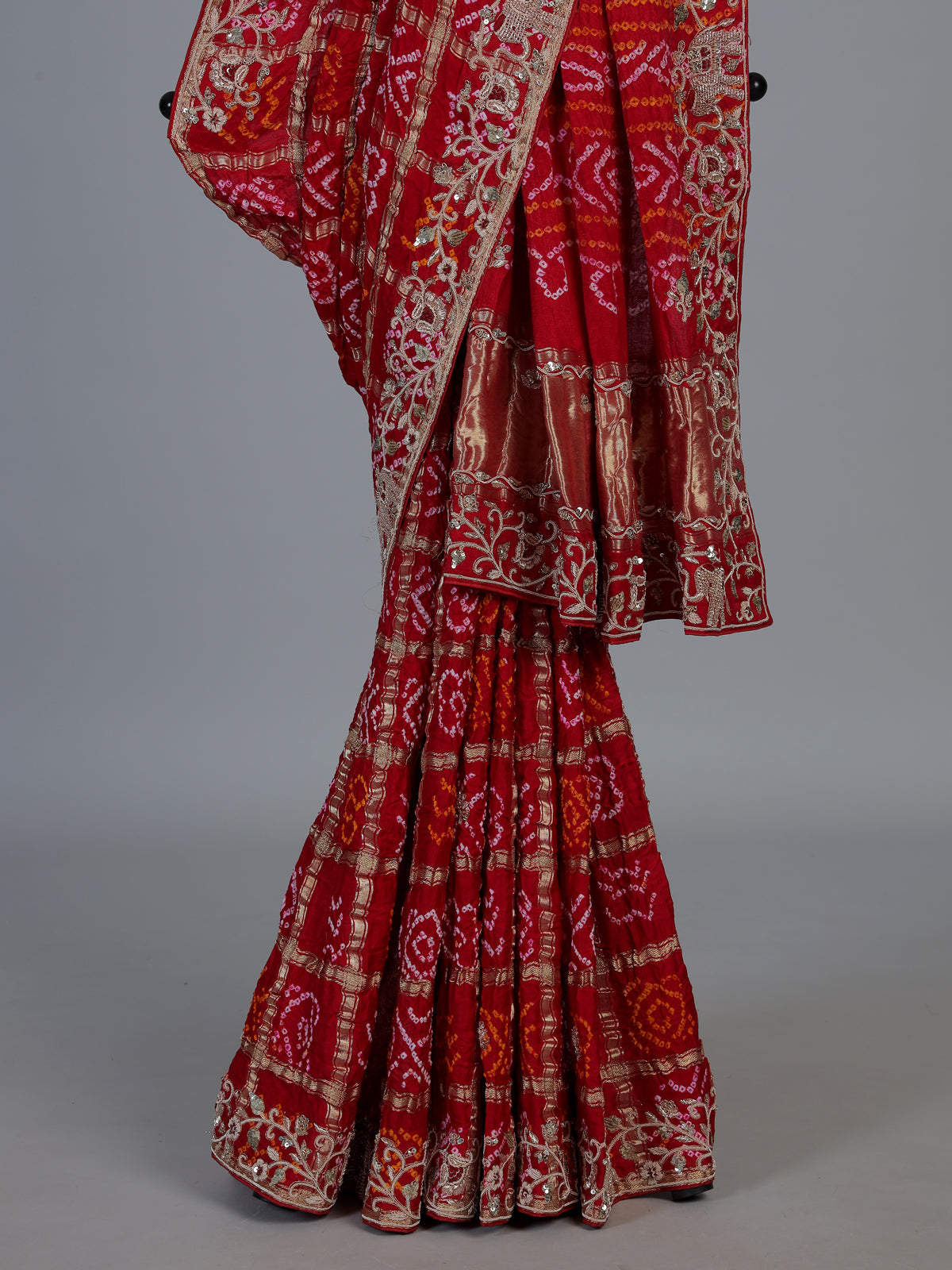 Red traditional bandhani silk bridal saree with elegance