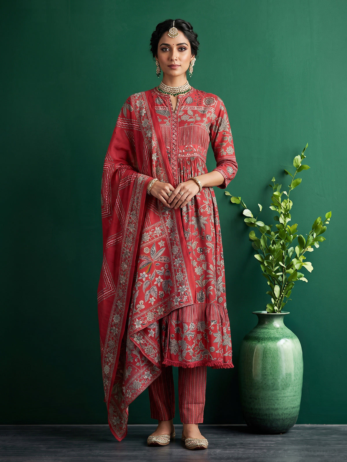 Red printed kurti set with kalamkari inspired charm