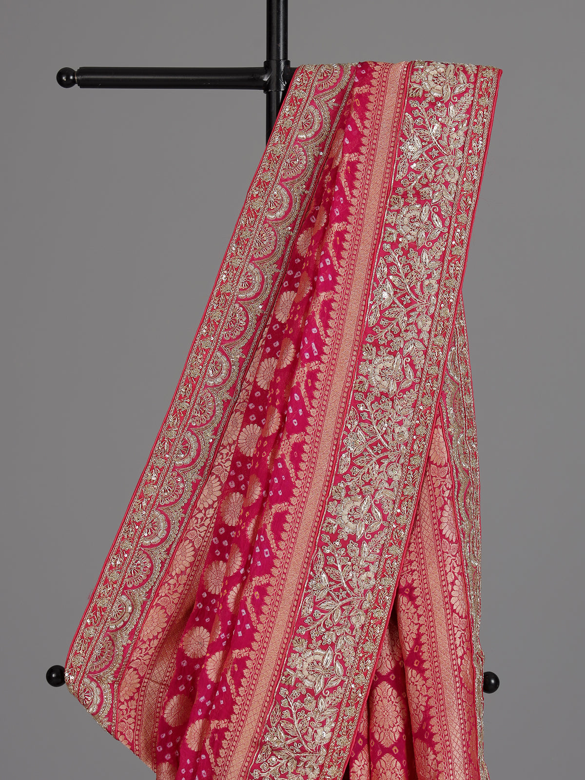 Rani pink georgette designer saree with festive elegance