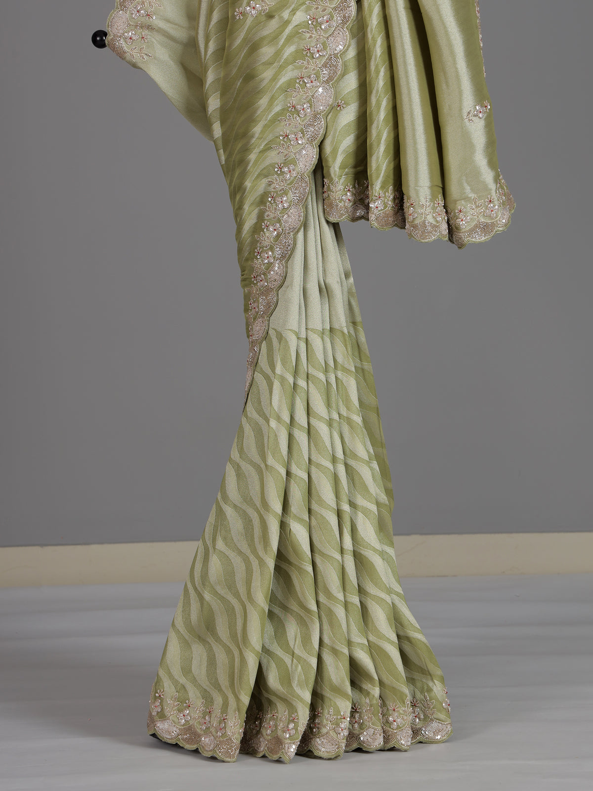 Pista green tissue dola silk saree with graceful festive