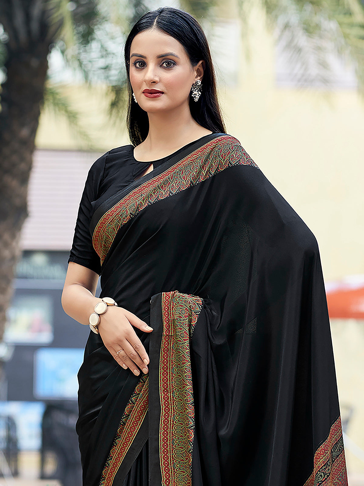 Black printed crepe silk casual saree with contrast border and pallu