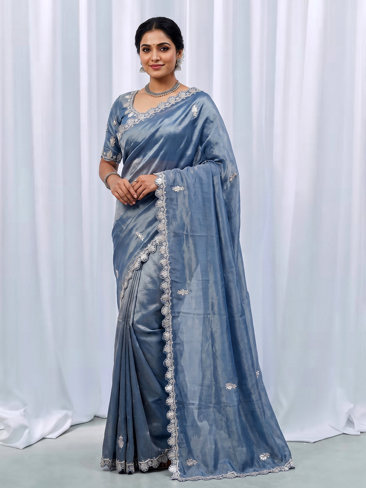 Elegant stone blue tissue silk saree for reception and party