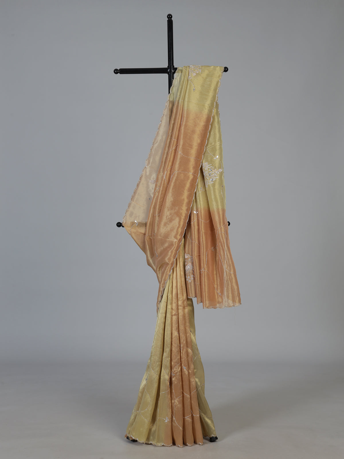 Pastel peach and green tissue silk designer festive saree with elegance