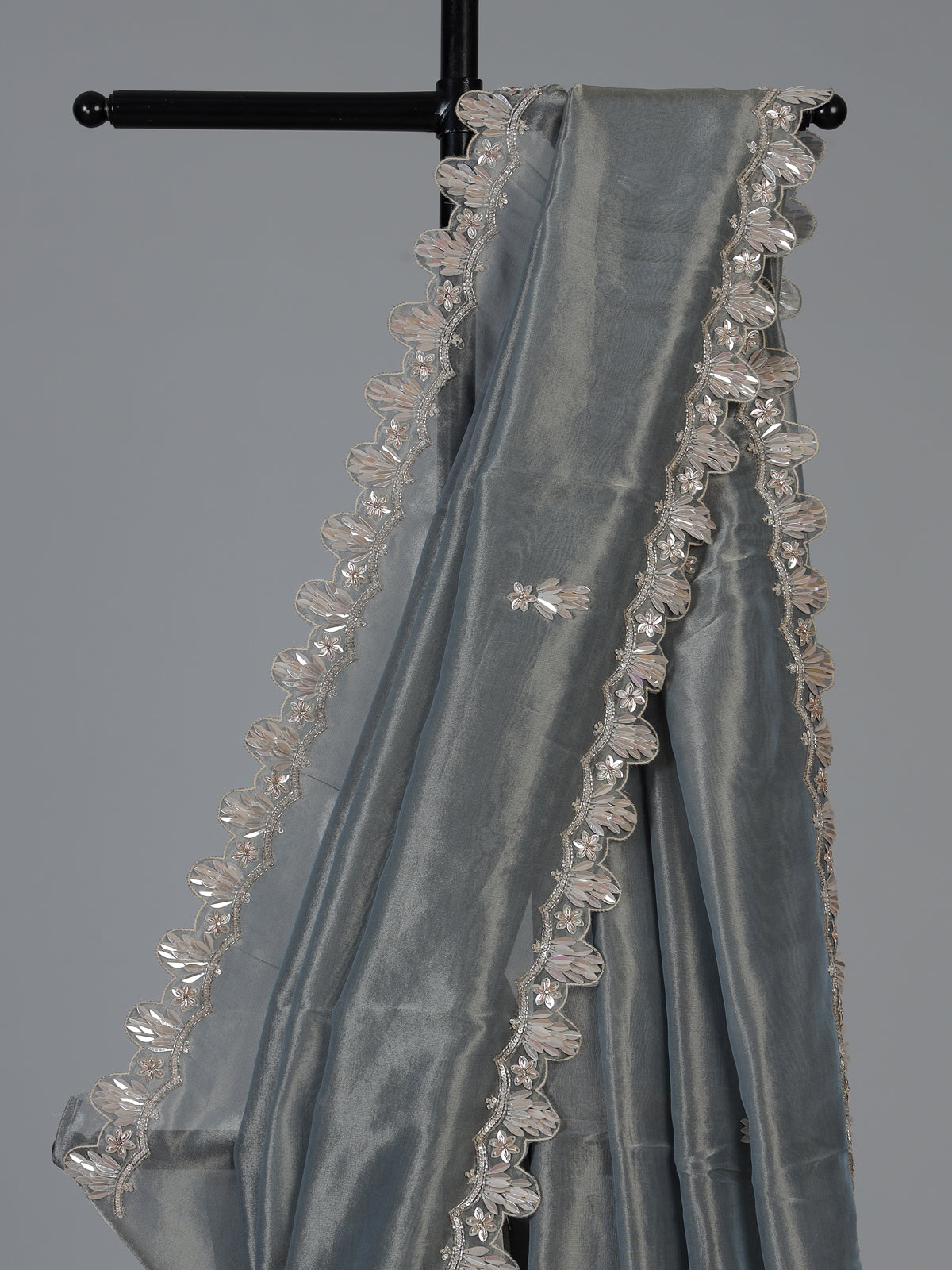 Pastel grey designer tissue silk saree with luxurious festive craftsmanship