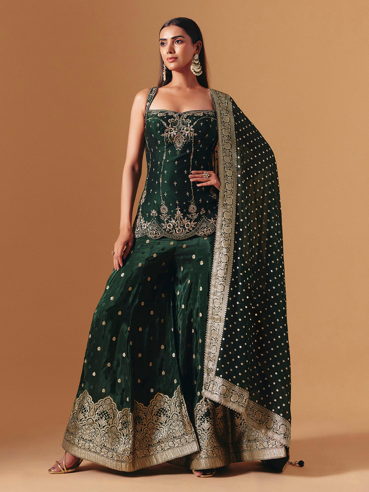 Green raw silk embroidered palazzo suit with elegant festive dupatta