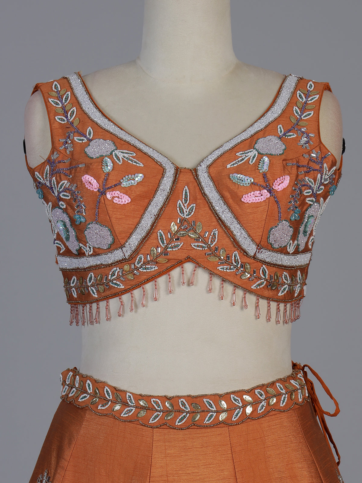 Rust orange raw silk swan motif lehenga choli with dupatta