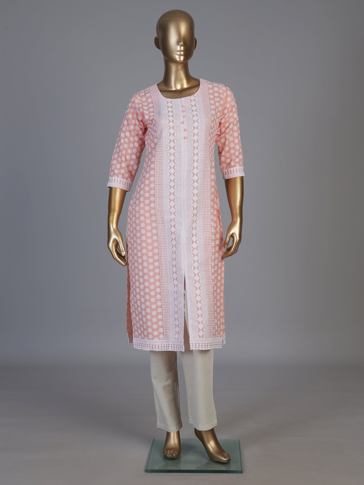 Peach chikan kurti with embroidery and elegant round neckline