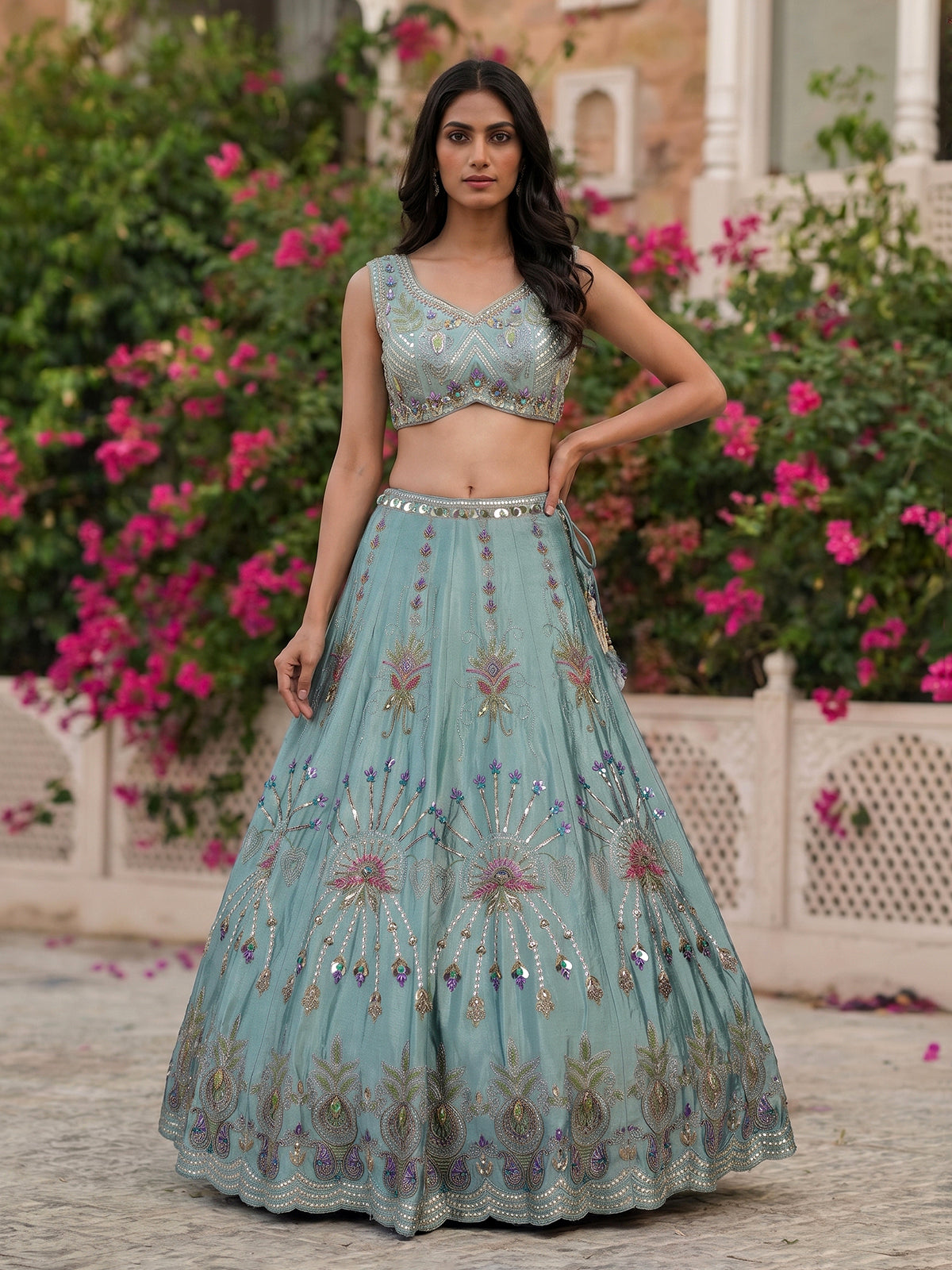 Light blue silk lehenga choli with pearls mirrors and zardosi work