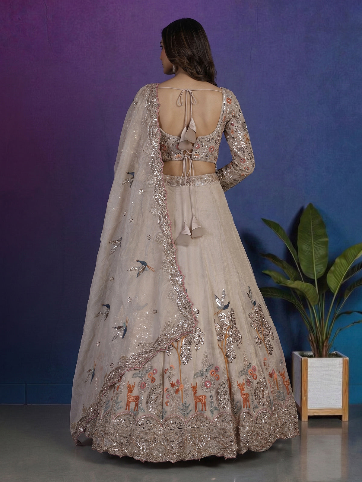 Beige silk designer lehenga choli with bird motif