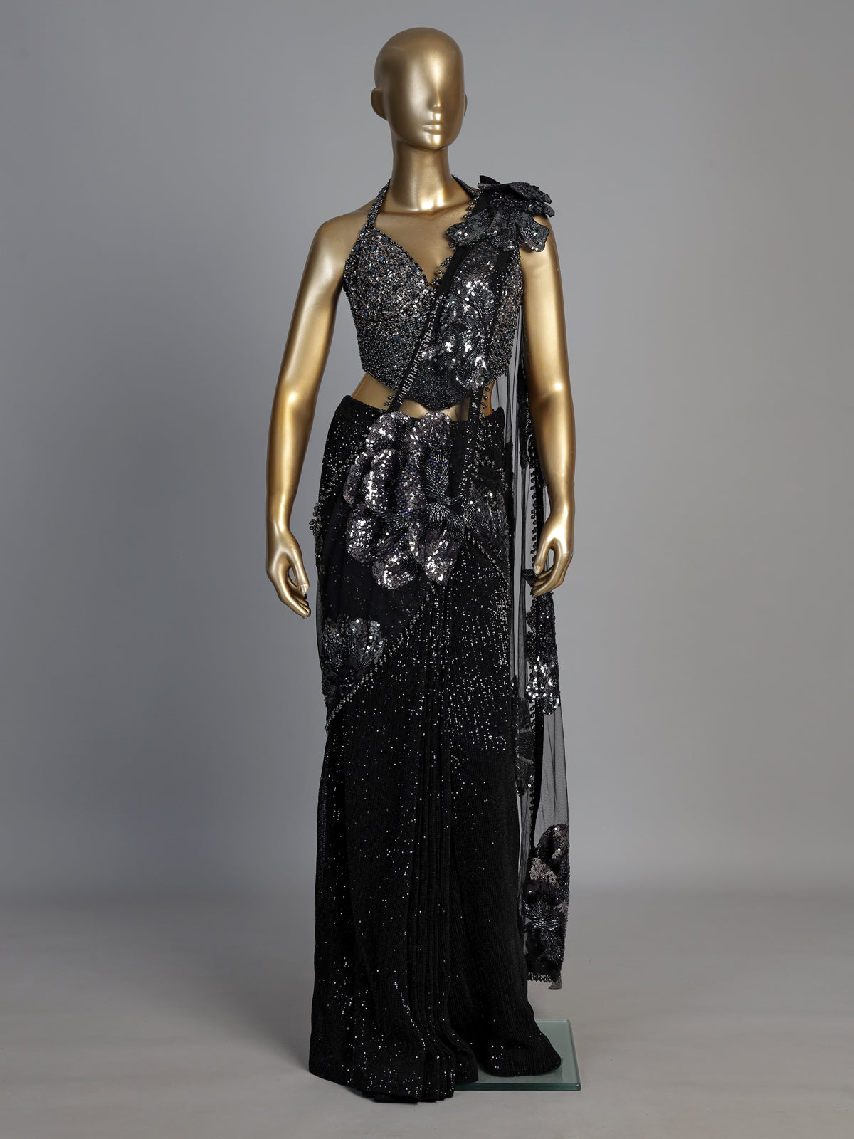 Black sequined net saree with halter blouse